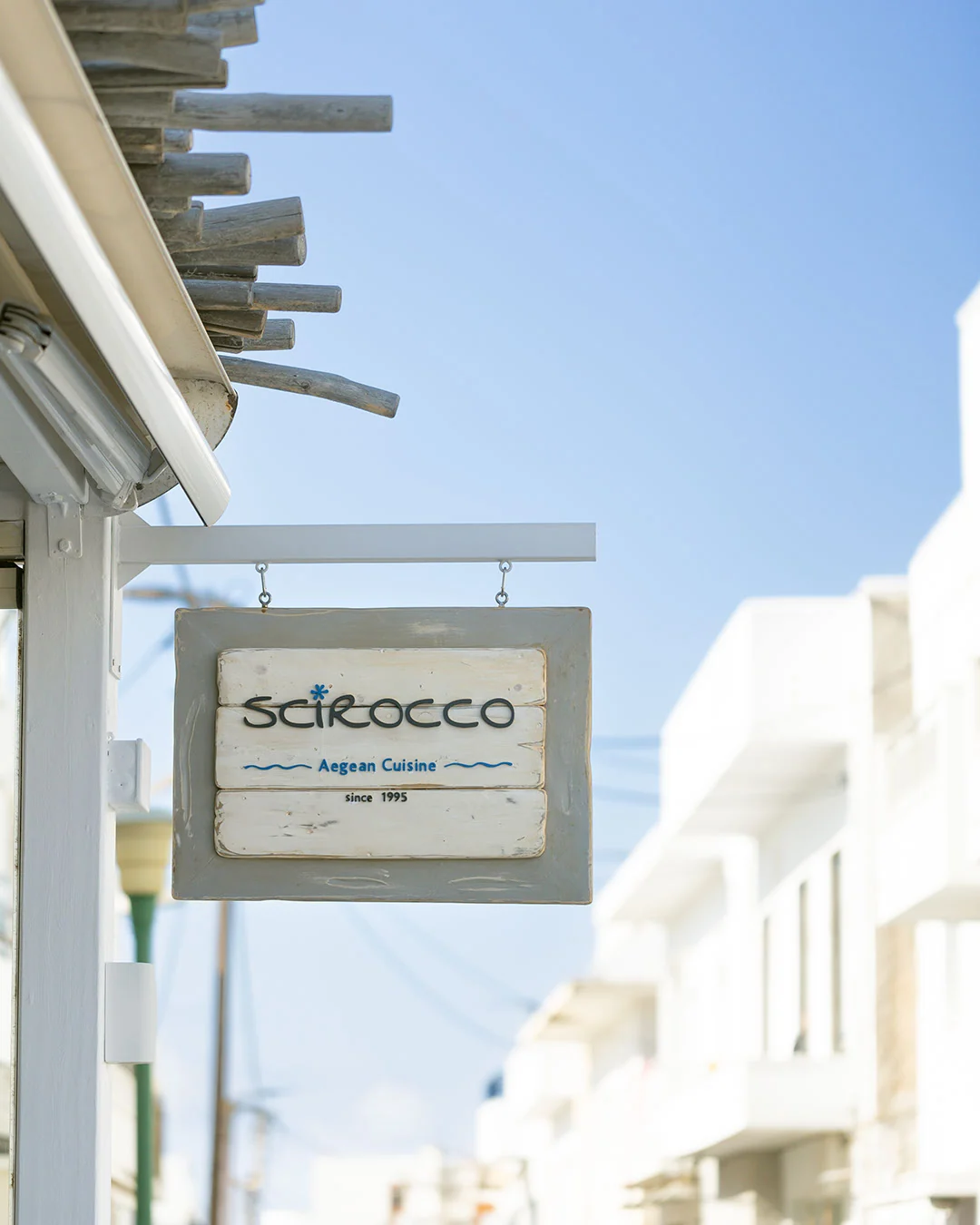 Scirocco Restaurant sign in Naxos
